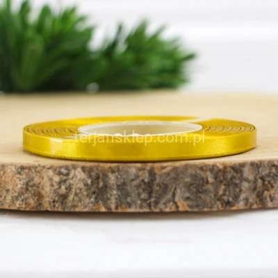 Taśma satynowa 6mm x 32 mb żółte złoto #104